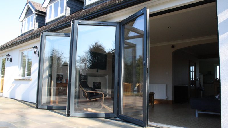 Aluminium Bifold Doors: Discover the benefits of aluminium bifold doors with this image showcasing their sleek design and functionality. Explore why aluminium bifold doors are a popular choice for modern homes.
