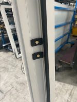 Enhanced door plate on a white door