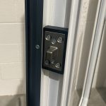 enhanced door bolt on a white upvc door frame